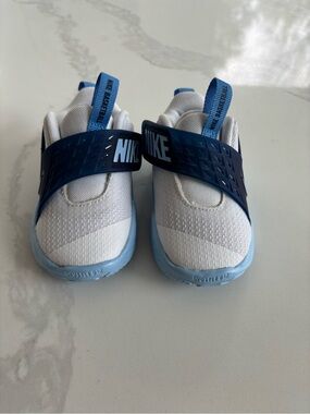 Nike Kids Slip-On Sneakers in White and Navy with Light Blue Sole